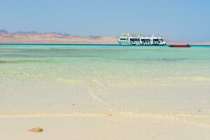 White boat in sea photo