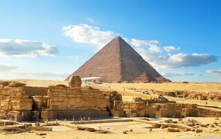 Egyptian pyramid in desert photo