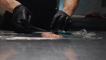 Chef places shrimp fillets for blast chilling into kitchen of hotel video