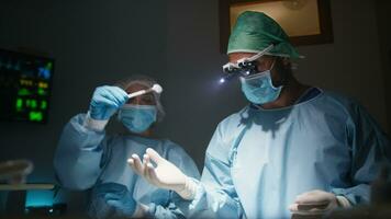 Dentist Extracts Tooth with Surgical Instruments video
