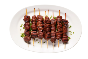 ai généré du boeuf kofta brochettes sur une blanc assiette isolé sur transparent Contexte. png