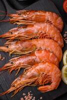Tiger shrimp or langoustine boiled with spices and salt photo