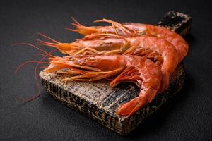 Tiger shrimp or langoustine boiled with spices and salt photo