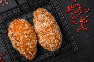 Delicious fresh cutlet or meatball Kiev style with filling photo