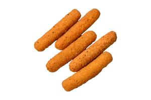 Delicious crispy cheese sticks with mozzarella, salt and spices, breaded and fried in oil photo