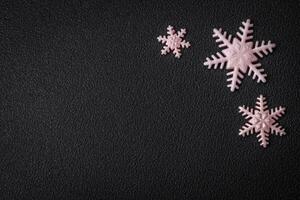 Beautiful winter snowflakes on a plain background with copy space photo