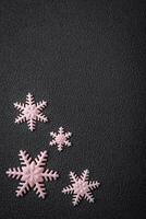 Beautiful winter snowflakes on a plain background with copy space photo