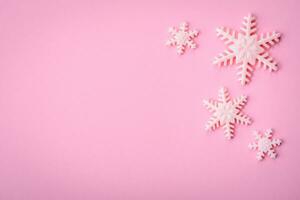 Beautiful winter snowflakes on a plain background with copy space photo