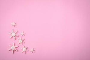 Beautiful winter snowflakes on a plain background with copy space photo