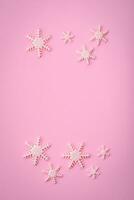 Beautiful winter snowflakes on a plain background with copy space photo