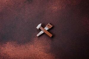 Tools and inscriptions symbolizing repairs or a garage and its attributes on a plain background photo