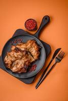 Delicious fresh crispy chicken grilled with salt, spices and herbs photo