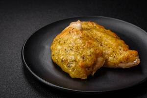 Delicious meat fried with Dijon mustard with salt, spices and herbs photo