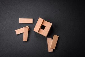 Wooden blocks of Jenga game as a concept idea of risk in achieving a goal photo