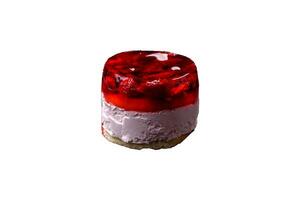 Delicious fresh sweet cheesecake cake with berries and red color jelly photo
