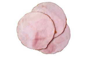 Delicious fresh ham cut into round slices with salt, spices and herbs photo