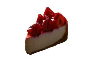 Delicious fresh cheesecake with strawberries, syrup and mascarpone cheese photo