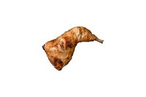 Fresh grilled chicken leg with salt, spices and herbs photo