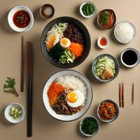AI generated korean food with chopsticks and bowls on a beige background photo