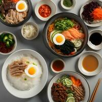 AI generated a variety of bowls with rice, meat, vegetables and eggs photo