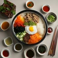 AI generated a bowl of rice with various ingredients and chopsticks photo