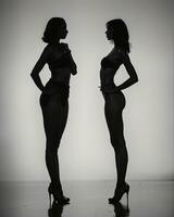 AI generated Silhouette of three women in black and white dresses, studio shot. ai generative photo