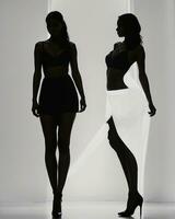 AI generated Silhouette of three women in black and white dresses, studio shot. ai generative photo