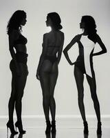 AI generated Silhouette of three women in black and white dresses, studio shot. ai generative photo