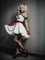 AI generated Beautiful young woman in pinup style dress and red high heels. ai generative photo