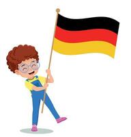 cute little boy holding flag vector