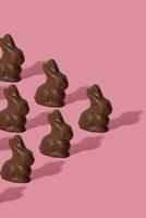 Chocolate rabbit pattern symbol to Easter holidays on a pink background. photo