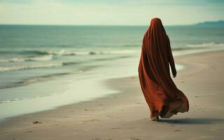 ai generado modesto musulmán mujer playa caminar foto