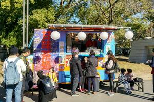 Osaka City, Japan, 2019 - Japanese snack booth track at Osaka Castle Park on bright and fresh day. It has attracted many tourists. photo