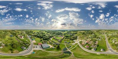 aerial hdri 360 panorama view over provincial town from great height in equirectangular seamless spherical  projection. may use like sky replacement for drone 360 panorama photo