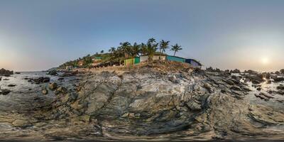 full hdri 360 panorama view on ocean on shore with rocks in equirectangular projection with zenith and nadir. VR AR content photo