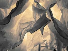 Background and texture of crumpled paper with lights. photo