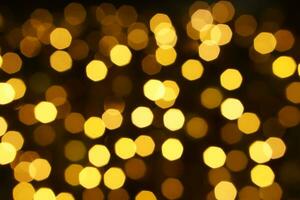 Abstract blurred and bokeh of party yellow LED reflection lighting on night time background. photo