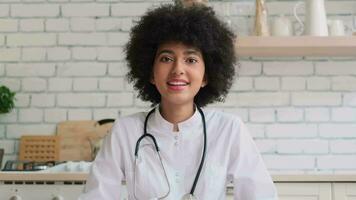 Afro american woman doctor during online consultation. Family Doctor, Patient Support, Help at Home, Caring for the Sick. video