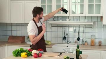 Vegan Cooking, Male Chef, Healthy Eating, Food Delivery. Man taking a selfie while standing in the kitchen before preparing a vegan meal video