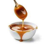 AI generated Liquid caramel topping on white backgrounds. photo