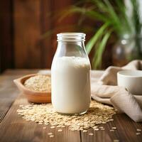 Bottle of oat milk on tables. photo