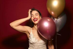 Overjoyed young beautiful long haired brunette female with red lips holding raised hands on her head and smiling happily, having nice birthday party and being in high spirit photo