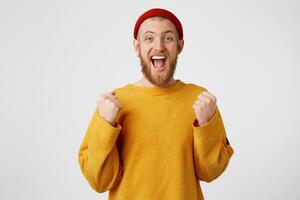 Close up photo portrait of attractive cool handsome bearded positive optimistic celebrating with open mouth nice humorous leader raise hands fists look at camera isolated white background