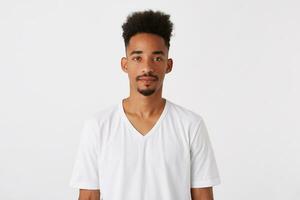 Closeup of confident attractive african american young man with afro hairstyle photo