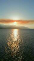 Aerial landscape view of Harrison Lake and mountains at sunset. video