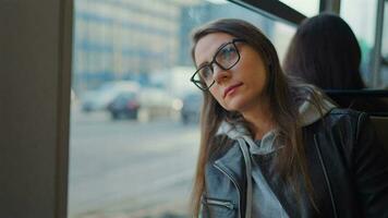 Public transport. Woman riding a tram in the city video