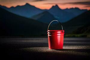 AI generated a red bucket sitting on the road in front of mountains photo