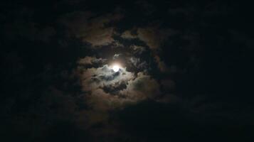 Beautiful magic blue night sky with clouds and full moon photo