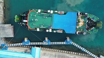 Aerial View of a Ferry Boat Anchored at Gorontalo Harbor in the Morning photo