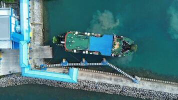 Aerial View of a Ferry Boat Anchored at Gorontalo Harbor in the Morning photo